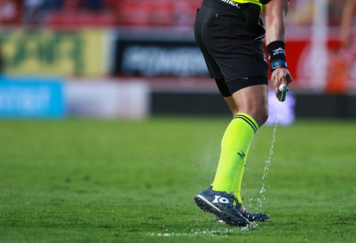 Arbitro spray